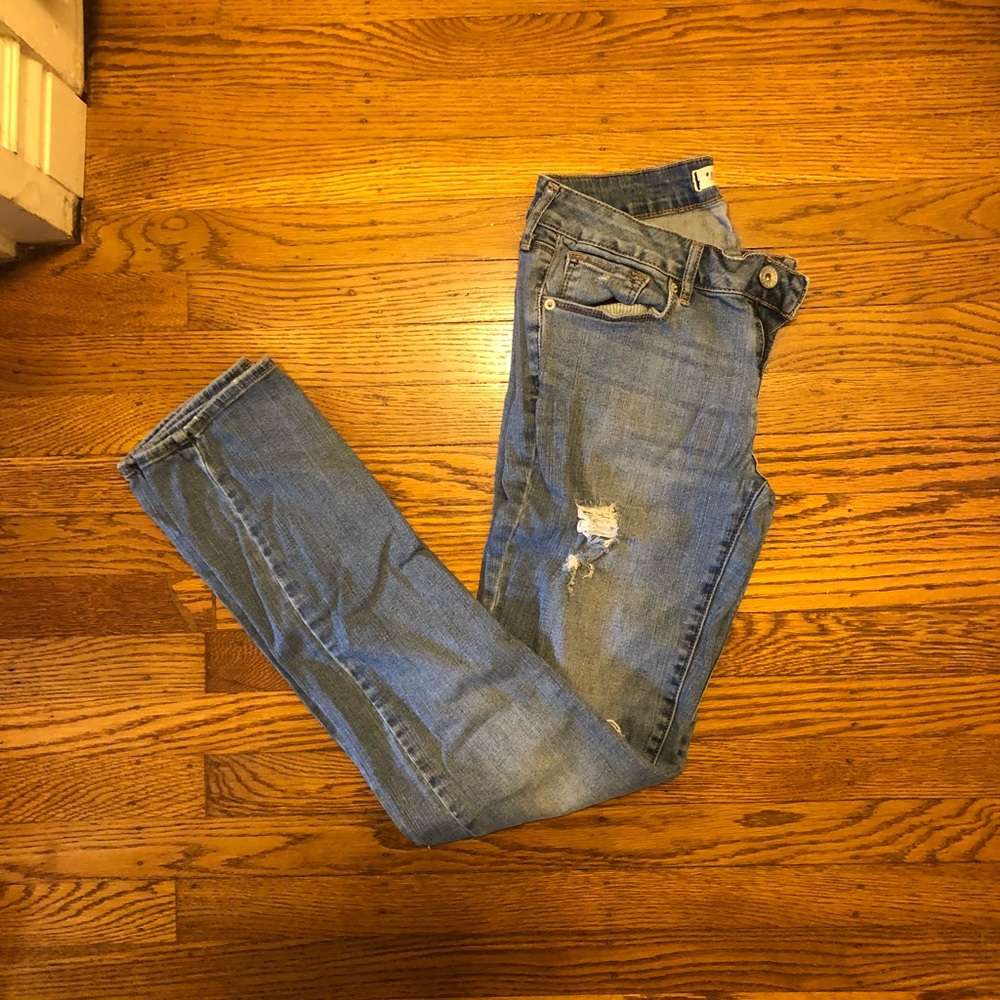 Light blue distressed skinny jeans